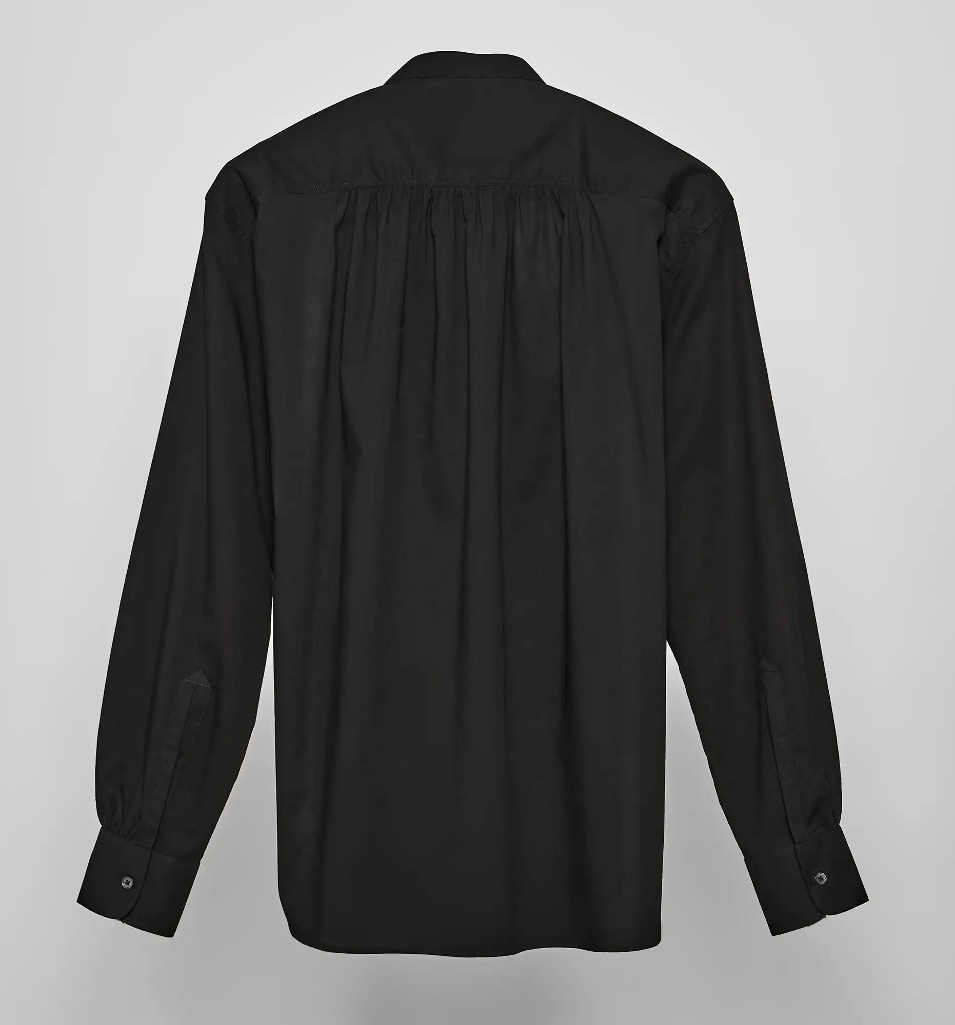Back view of a black Sébline pullover shirt on a neutral background