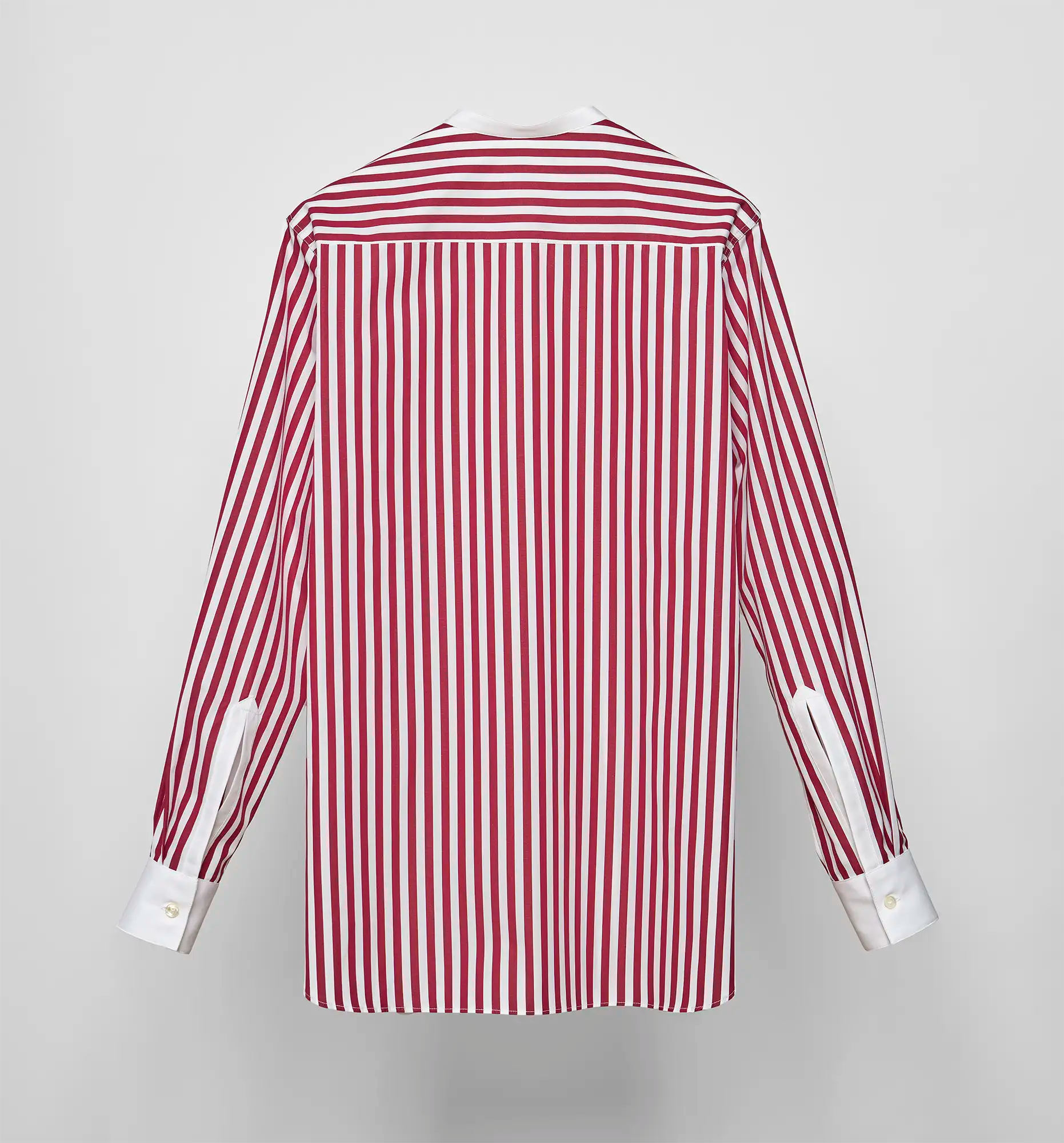 Sébline red-and-white striped long-sleeve shirt, back view on grey background.