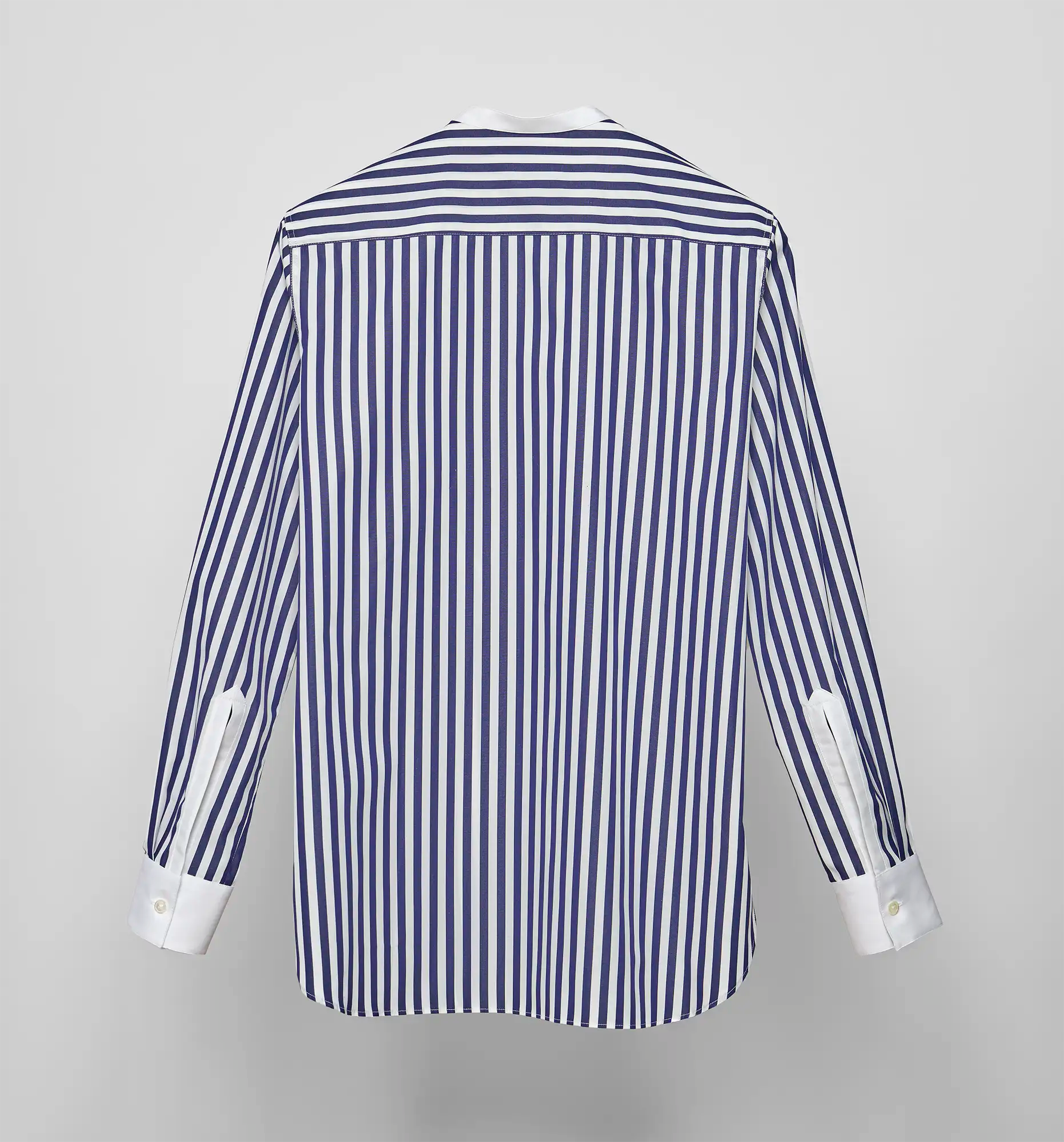Sébline navy-and-white striped long-sleeve shirt, back view on grey background.