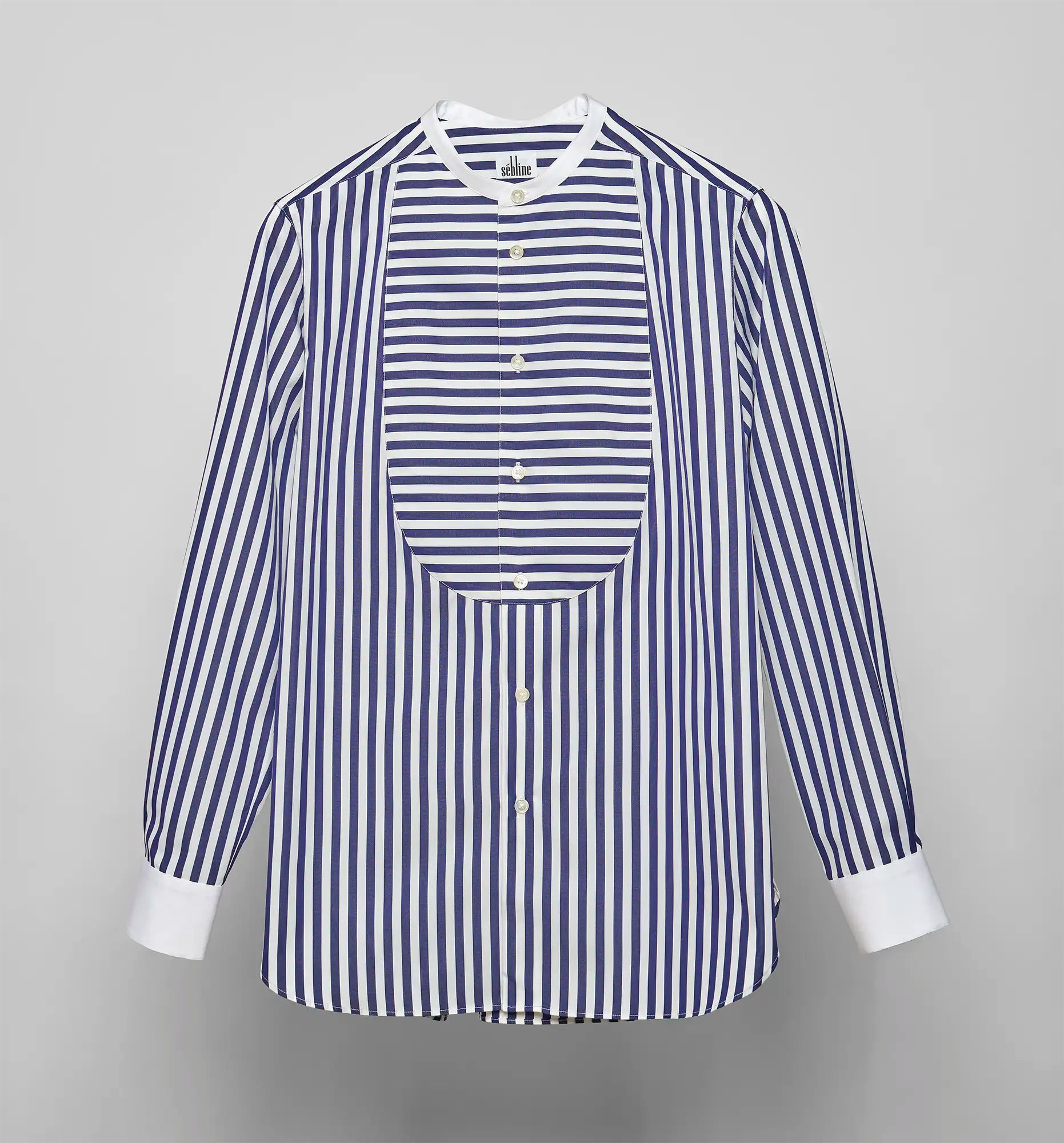 Sébline navy-and-white striped long-sleeve shirt with contrasting striped bib, front view on grey background.