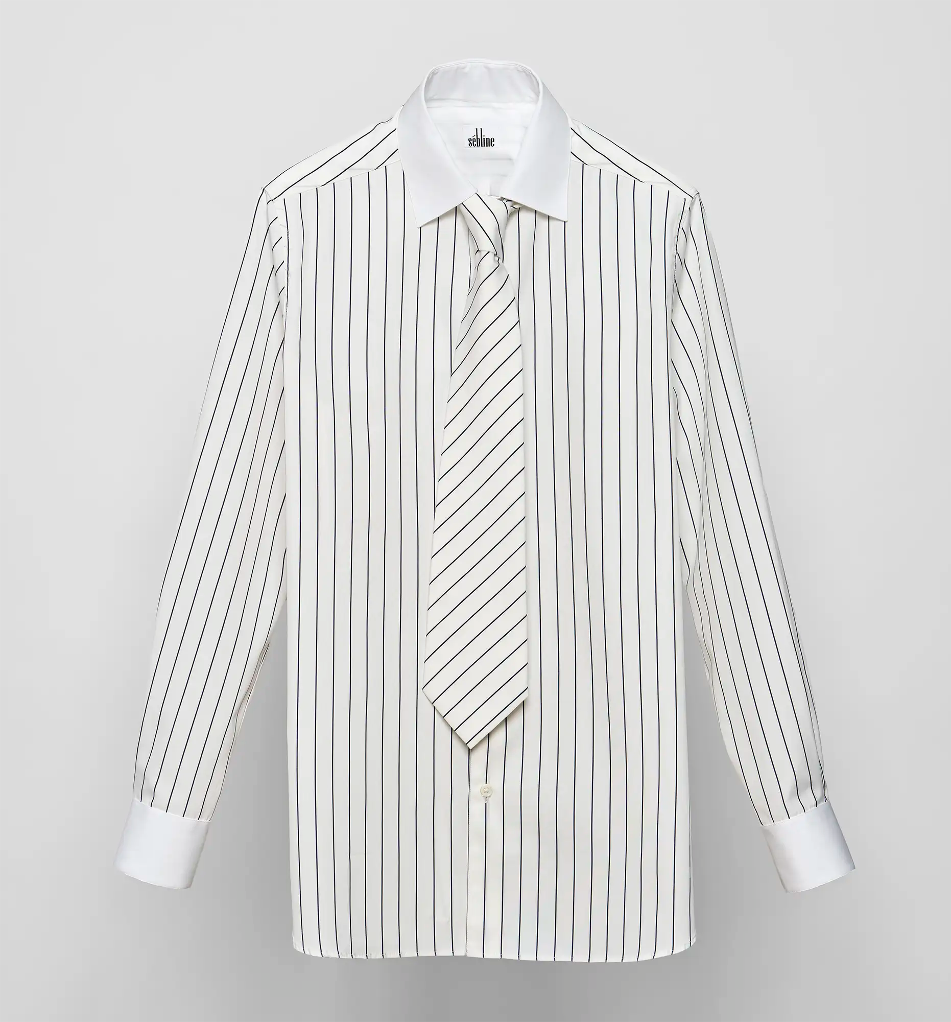 Off-white cotton poplin striped shirt with matching diagonal striped tie by Sébline, flat front view on neutral background.