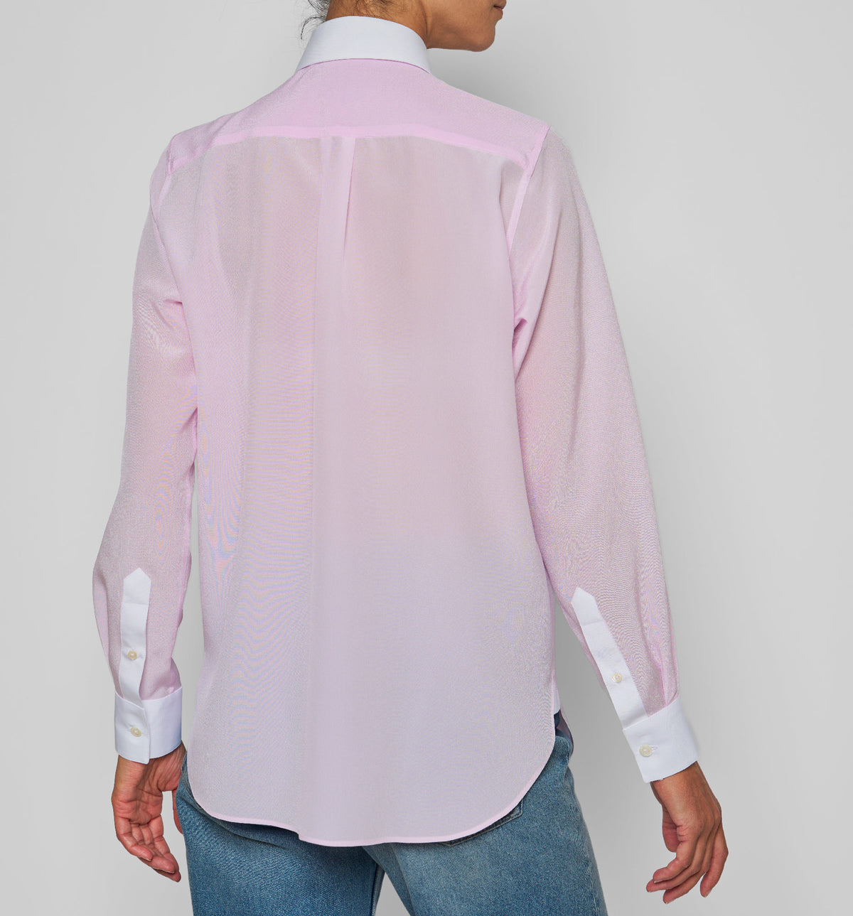 Women's Chemise de Garçon Placket – back view of light pink shirt with white cuffs, on model