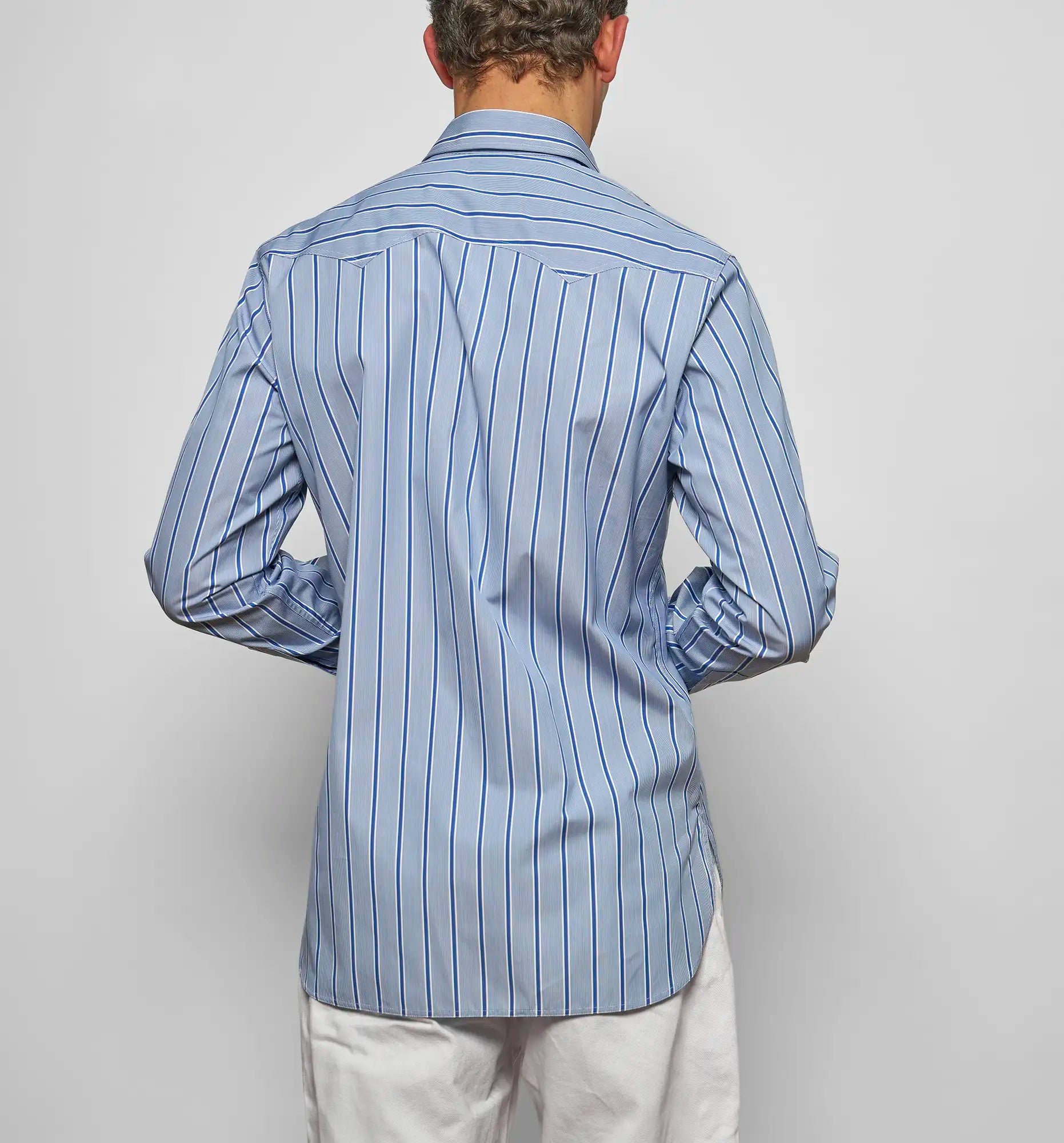 Cow Boy shirt in blue chambray, back view — Sébline SS26
