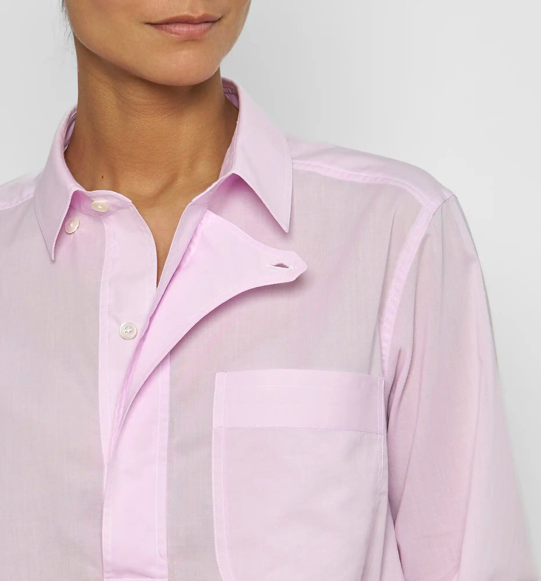 Combat polo shirt in pale pink — chest pocket and collar detail