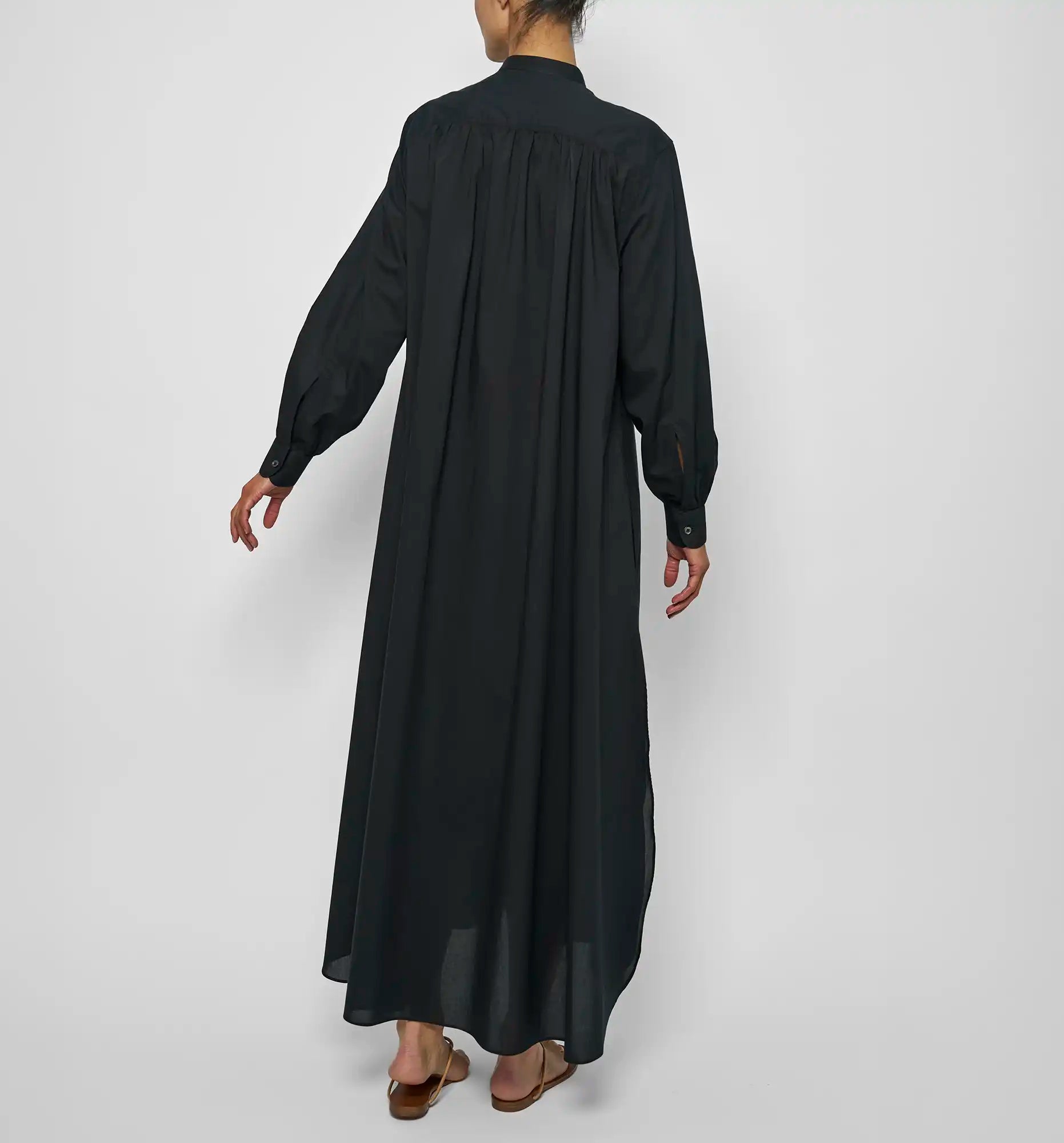 Long ruffle dress in black — back on-model view
