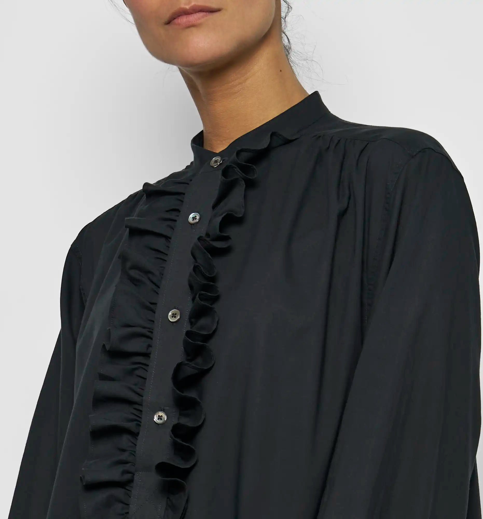 Long ruffle dress in black — bodice ruffle detail