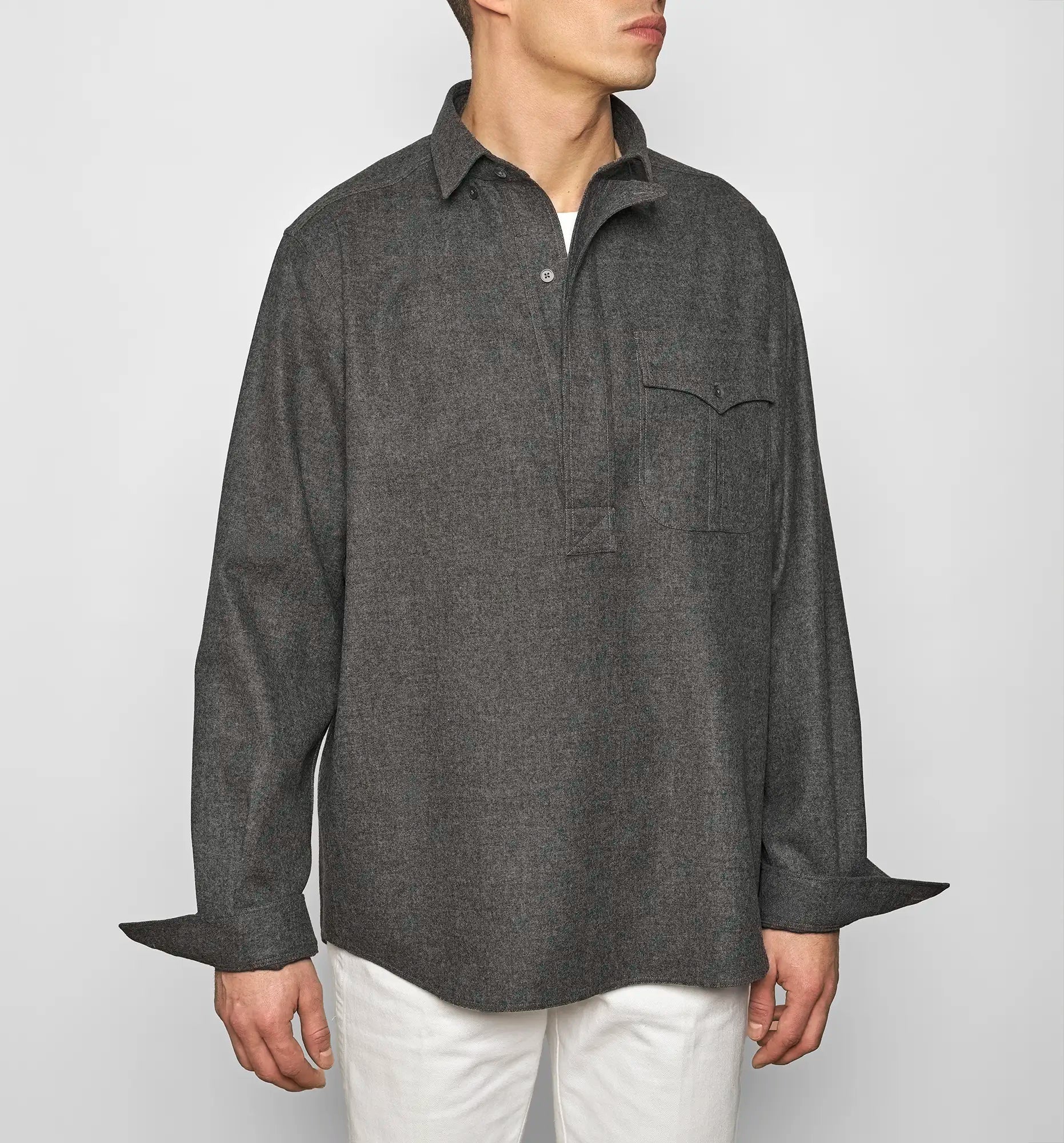 Front view of a charcoal gray Sébline shirt worn by a model