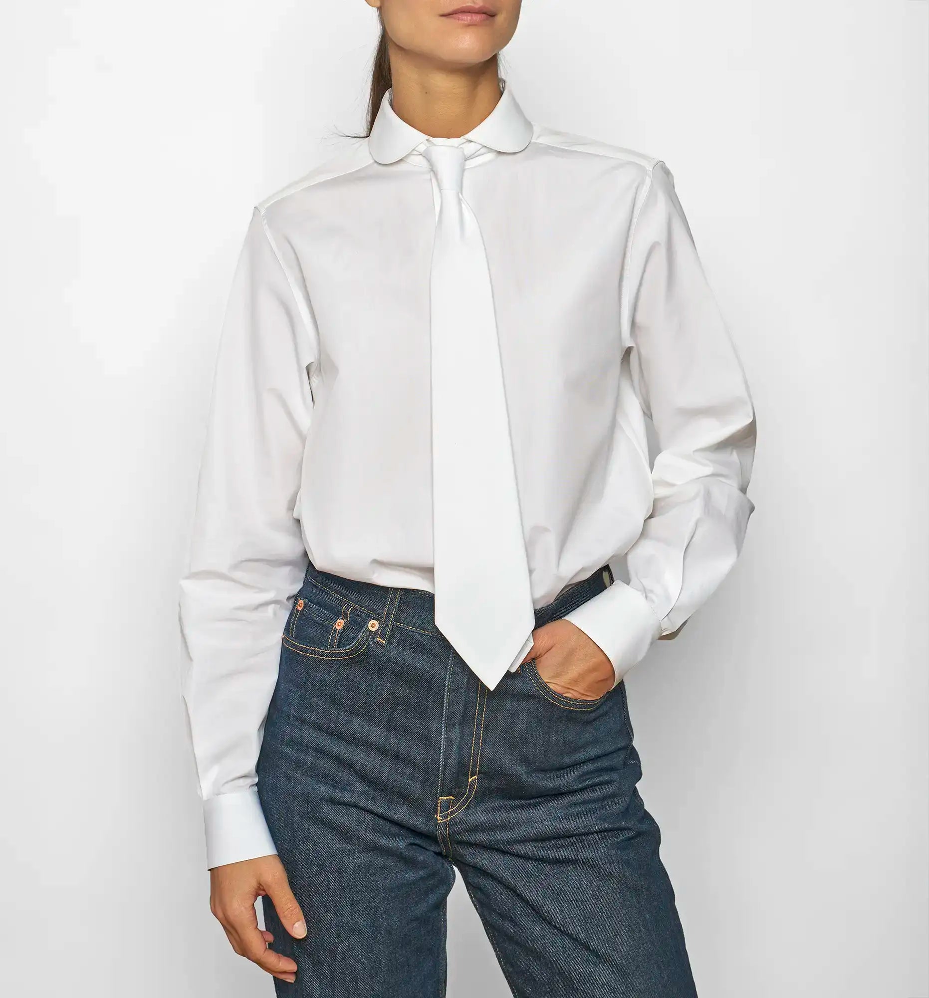 White chemise de garçon on female model with tie, front view — Sébline SS26