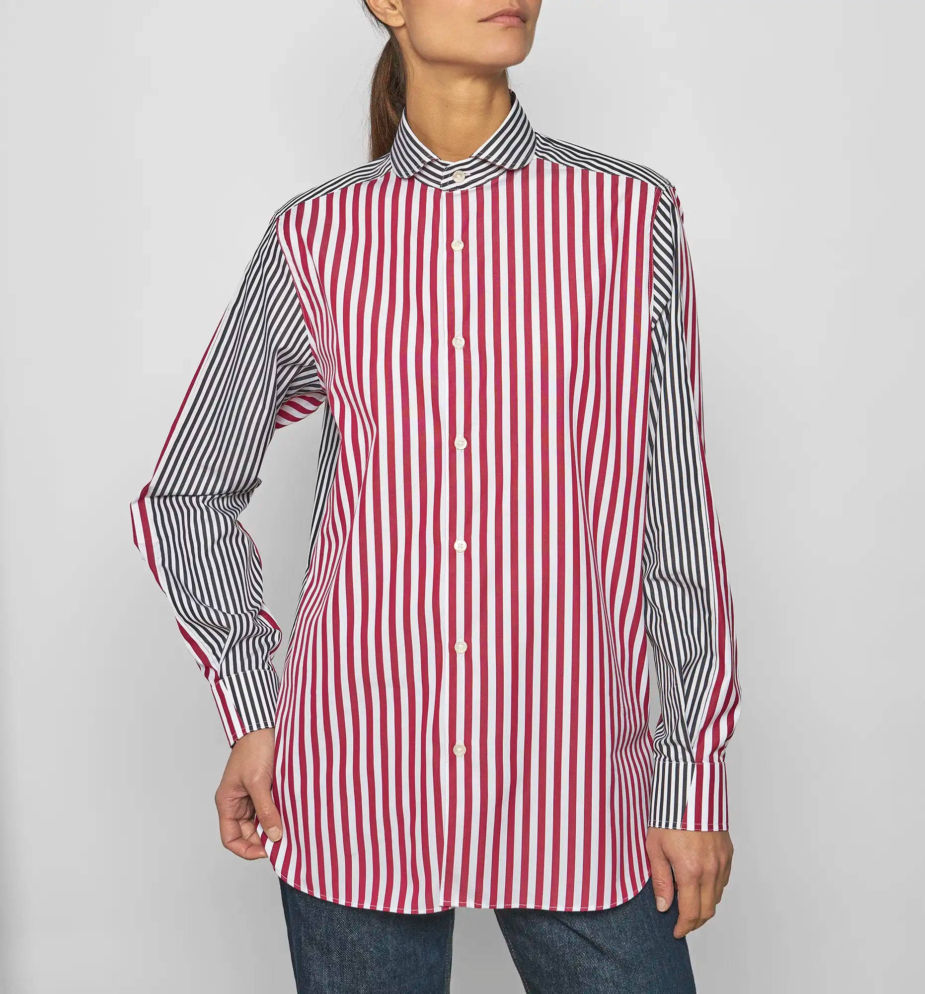 Model wearing Sébline patchwork striped cotton poplin shirt, front view.