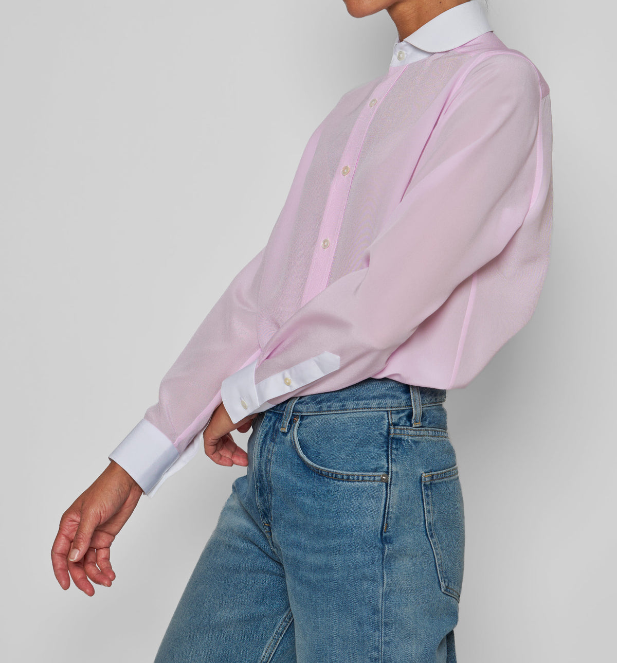 Women's Chemise de Garçon Placket – side view of light pink shirt with white collar and cuffs, on model