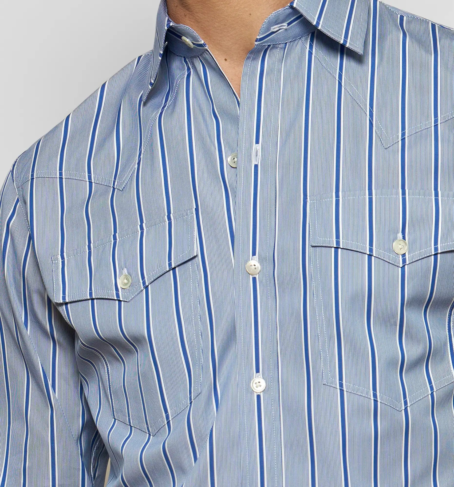 Cow Boy shirt in blue chambray, chest detail — Sébline SS26