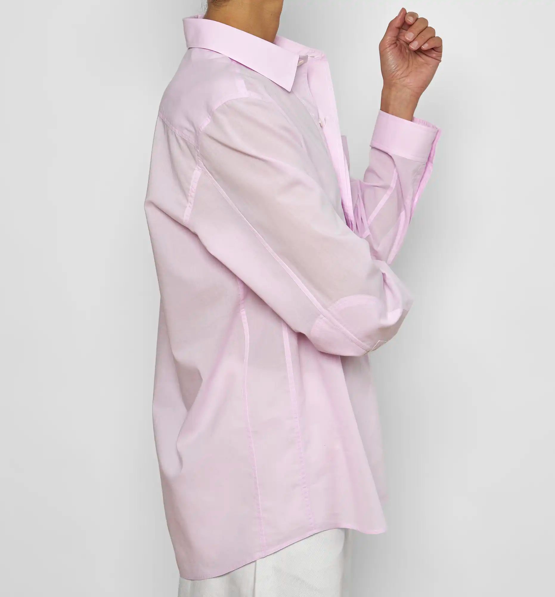 Combat polo shirt in pale pink stripes — sleeve detail