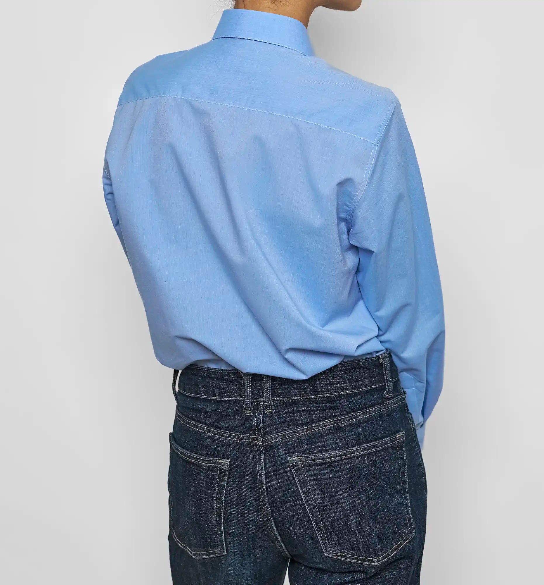 Pleated Bunny shirt in light blue chambray — back on-model view