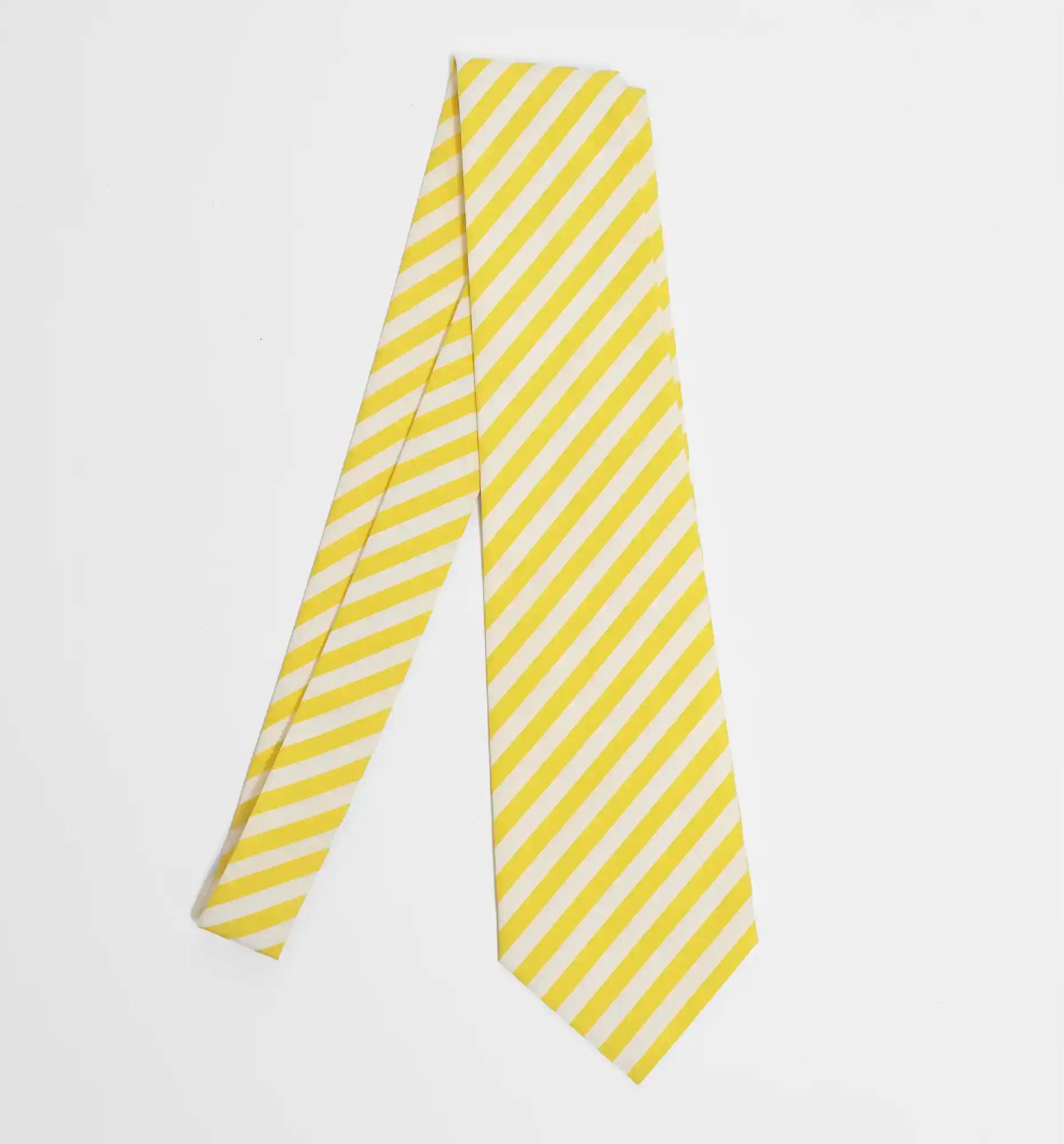 Yellow stripes tie — flat lay view