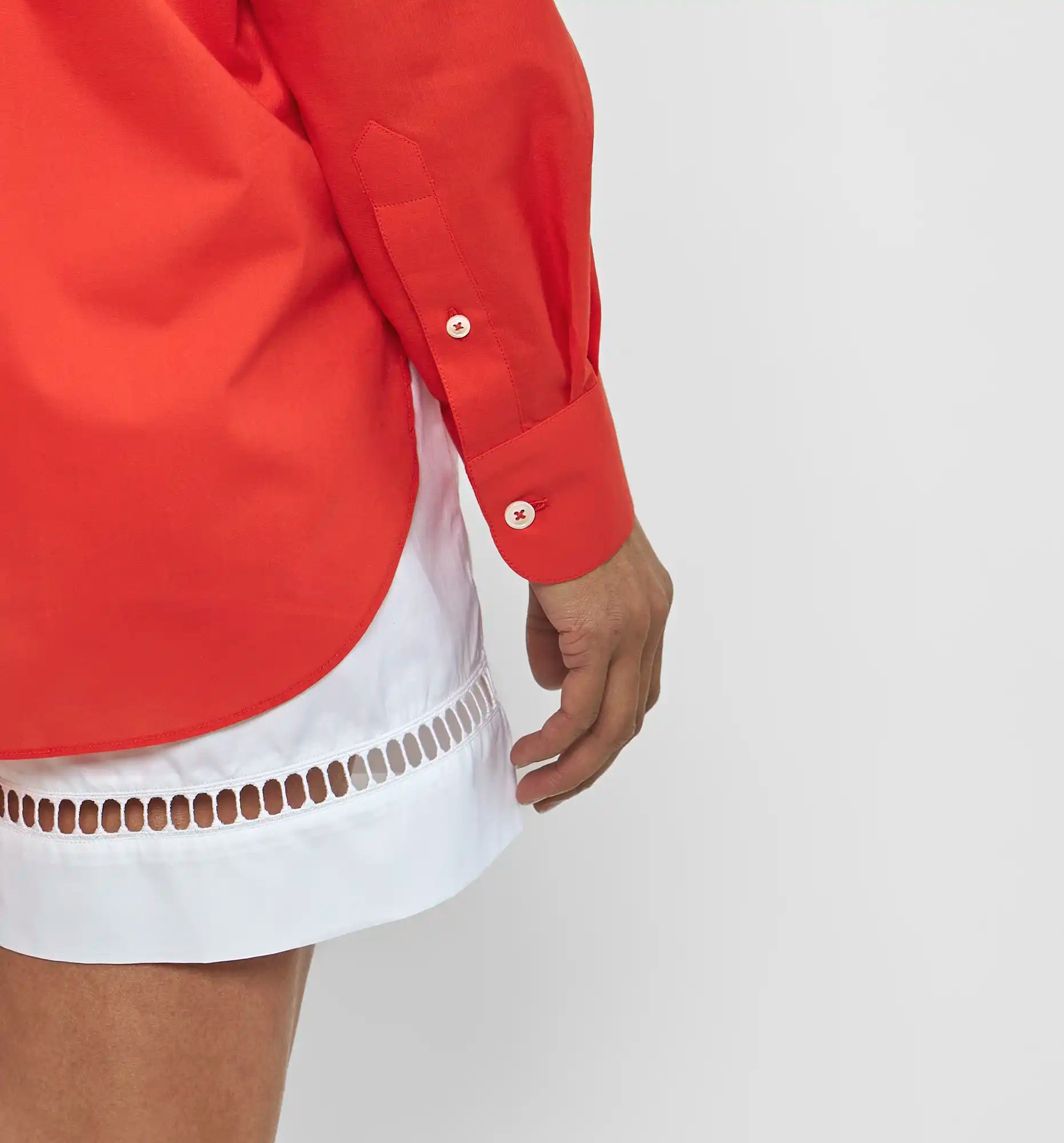 Work shirt in poppy red — placket and hem detail